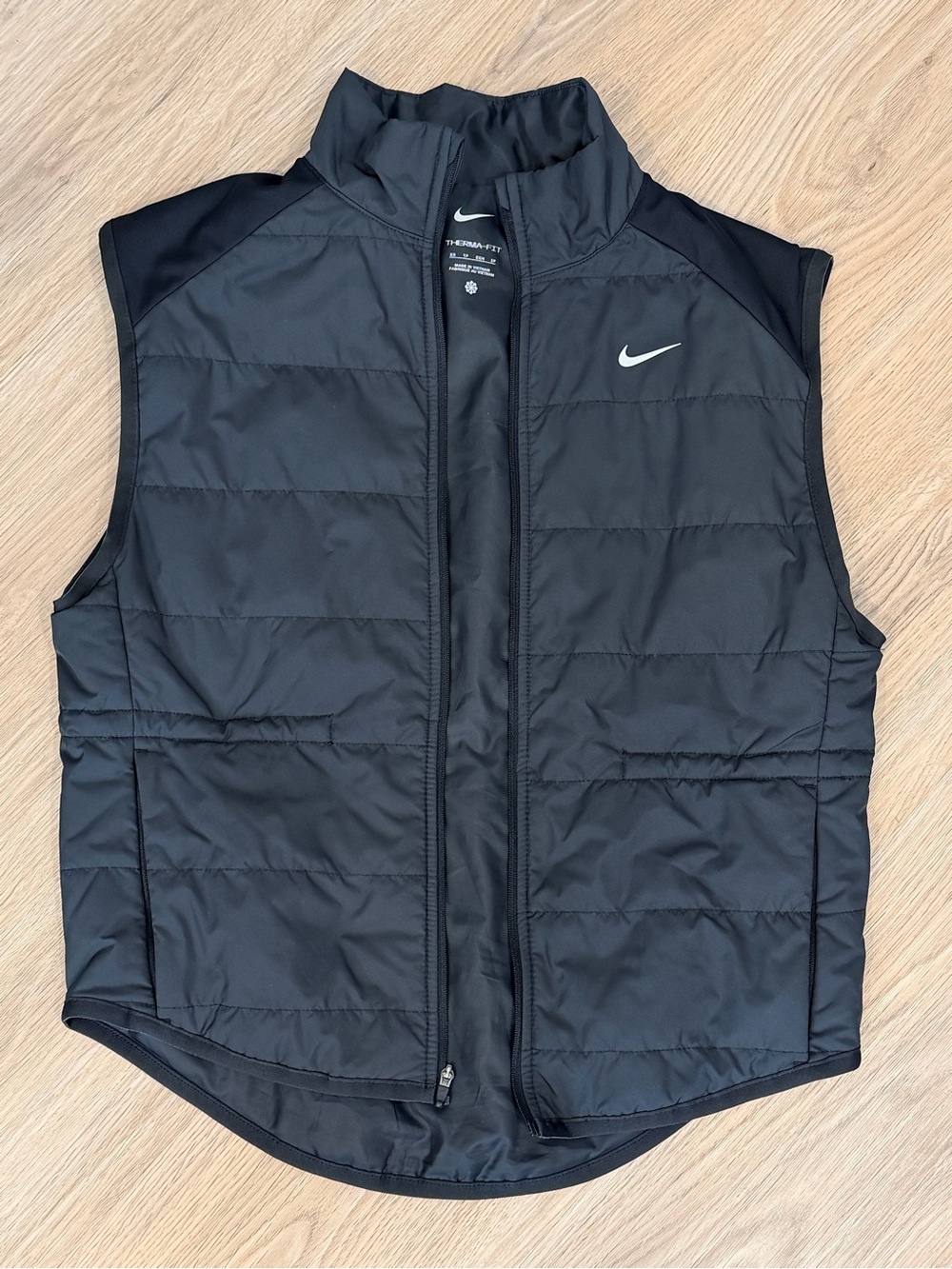 Nike Black Quilted Puffer Vest with White Swoosh